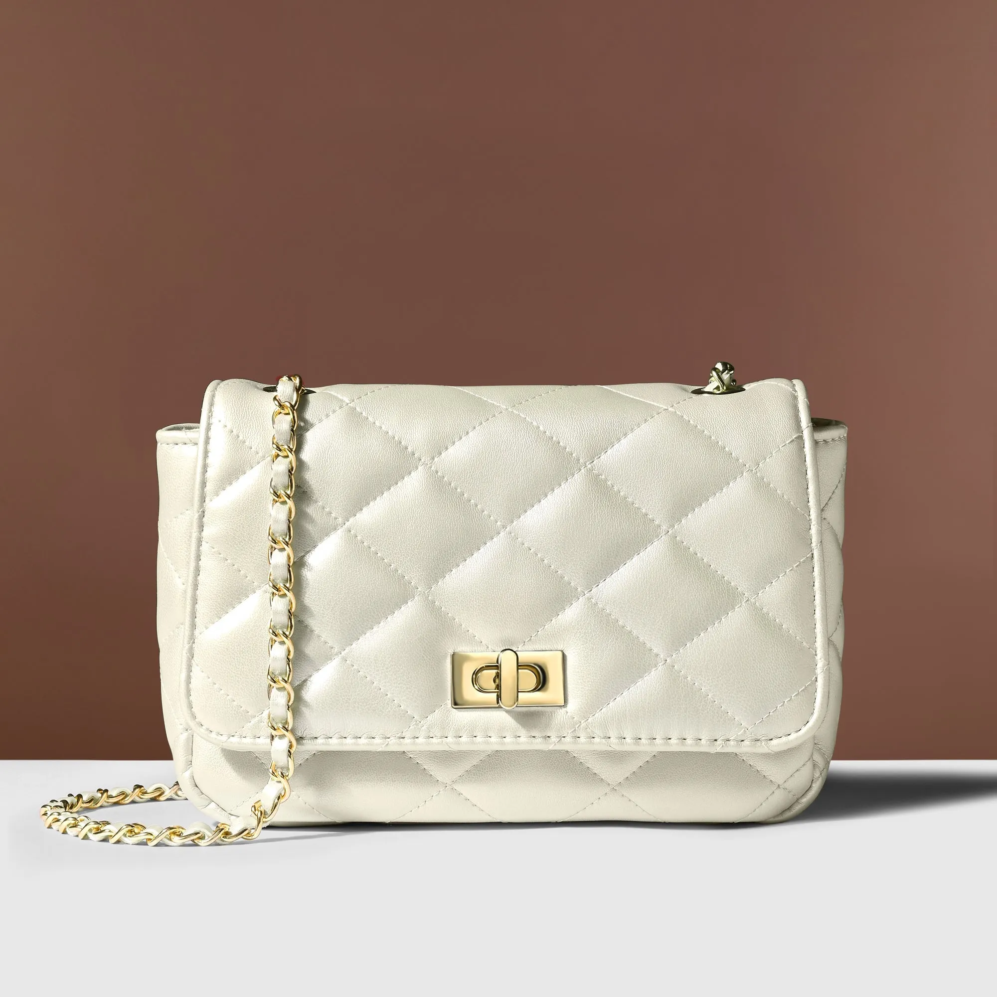 Accessorize London Women's White Quilted Twistlock Sling Bag