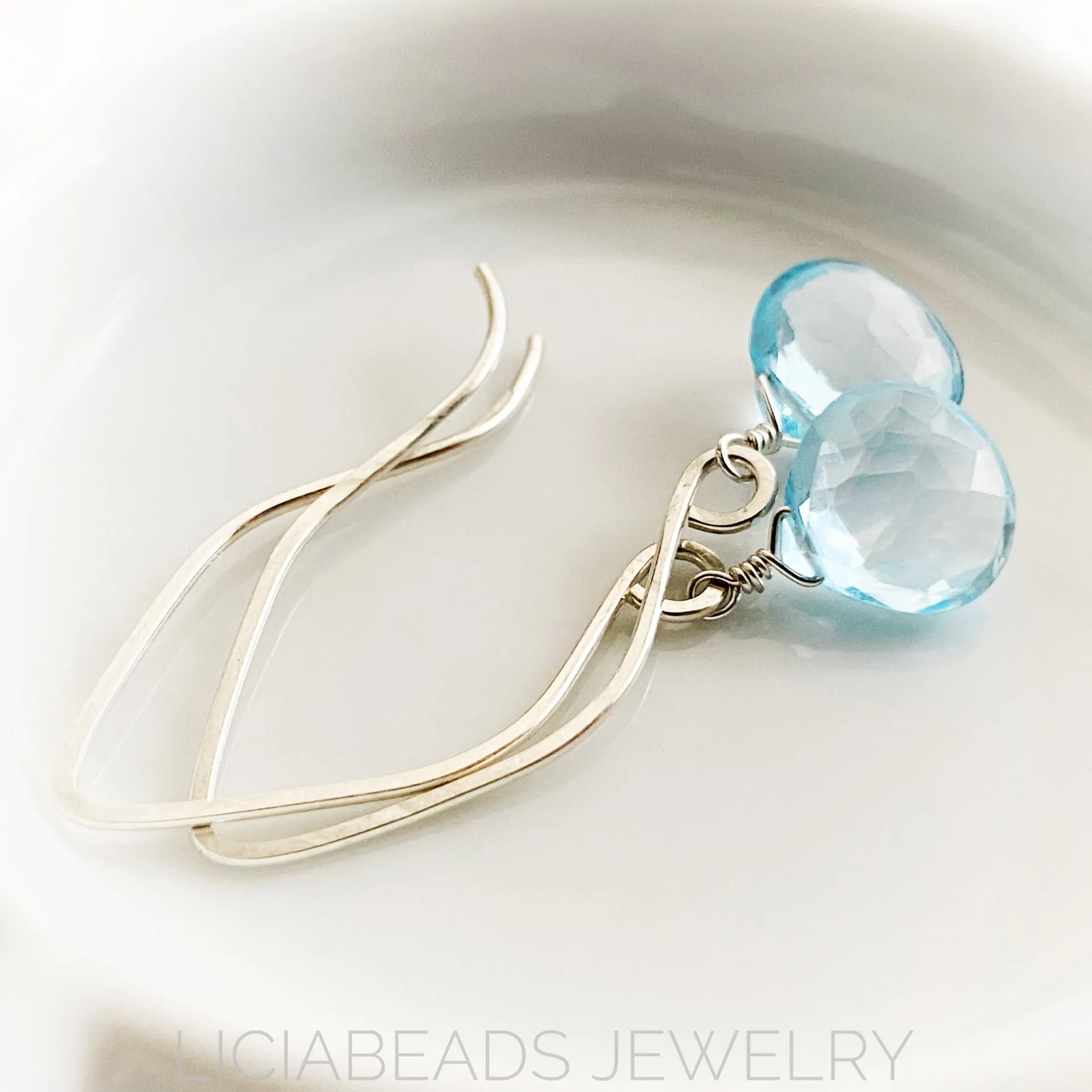 Sky blue topaz and sterling silver earrings